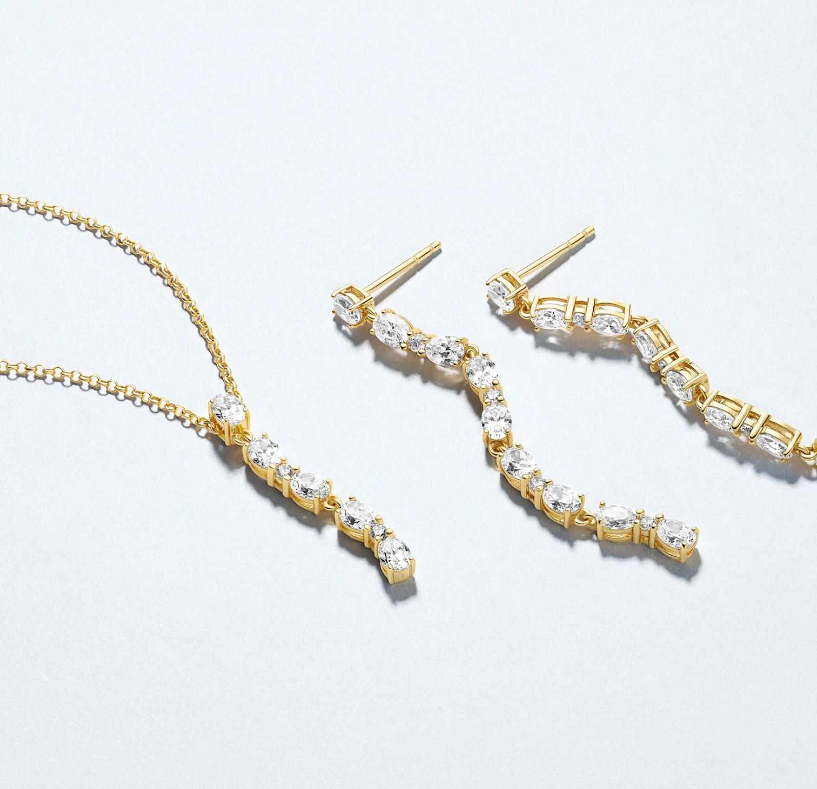 Gold CZ Ellera Ovale Sette Earrings
