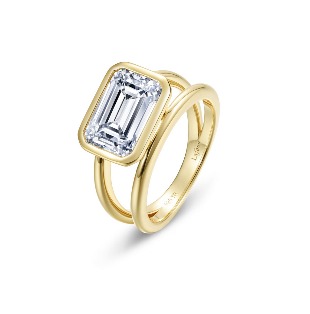 Gold Floating Emerald Split Shank Ring
